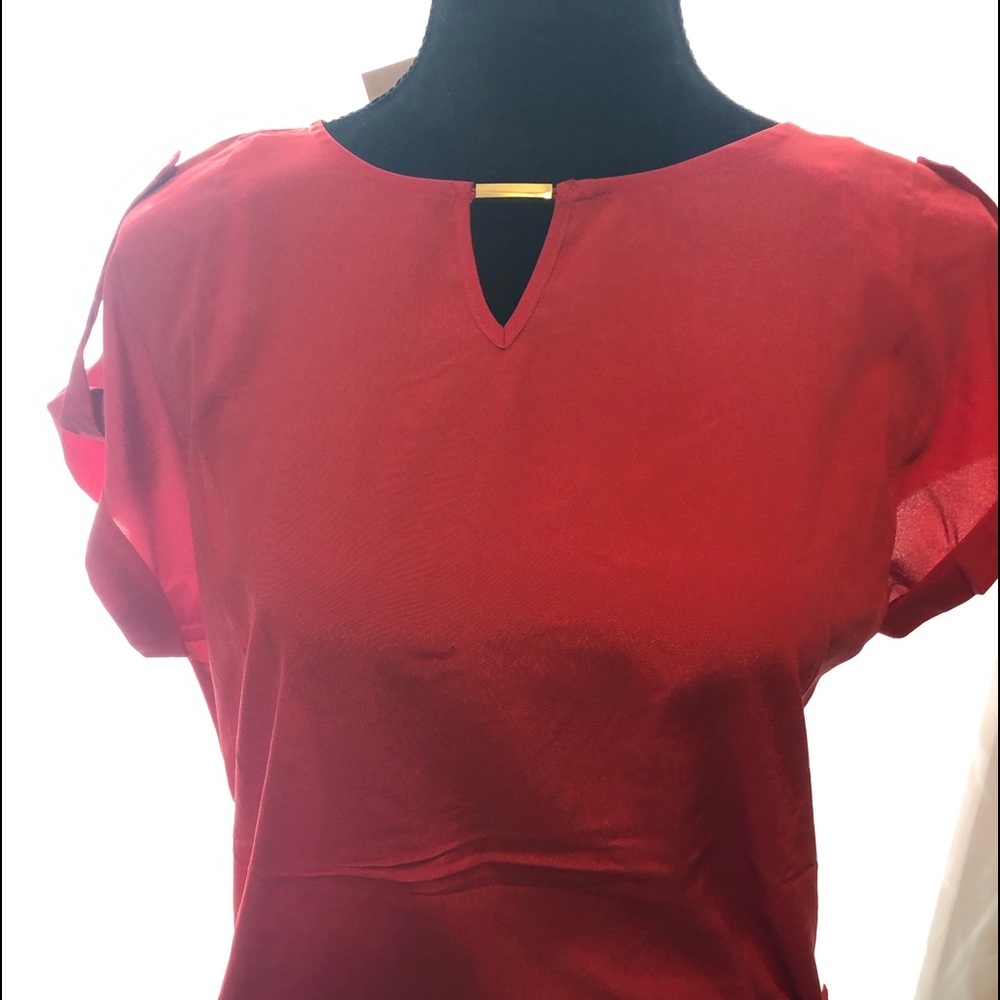 New red blouse with gold accents